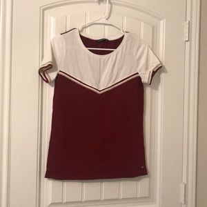 Maroon+white t-shirt with gold. Good as new.